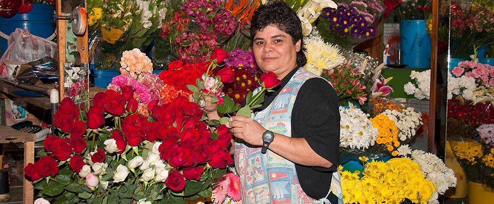 flower lady at central market in san jose
 - Costa Rica