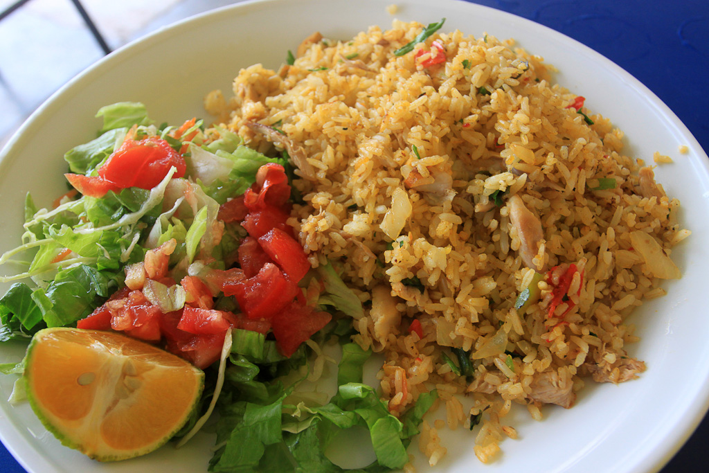        eating cheap arroz con pollo 
  - Costa Rica